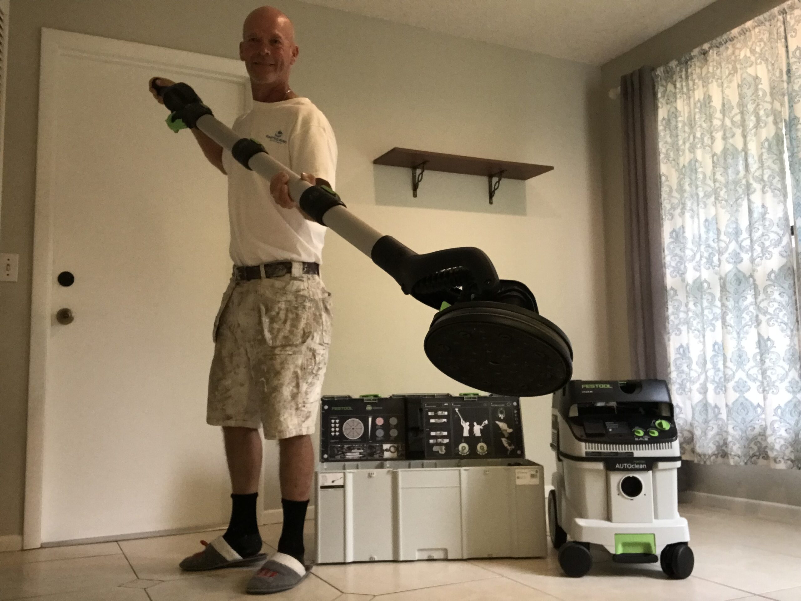 Festool vacuum for the Planex 2 system used to remove popcorn ceiling